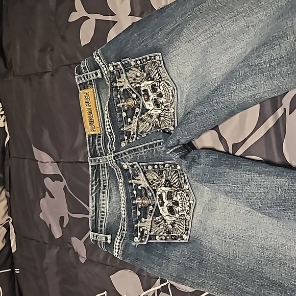 A pair of boot-cut  Platinum Plush jeans - Picture 8 of 11
